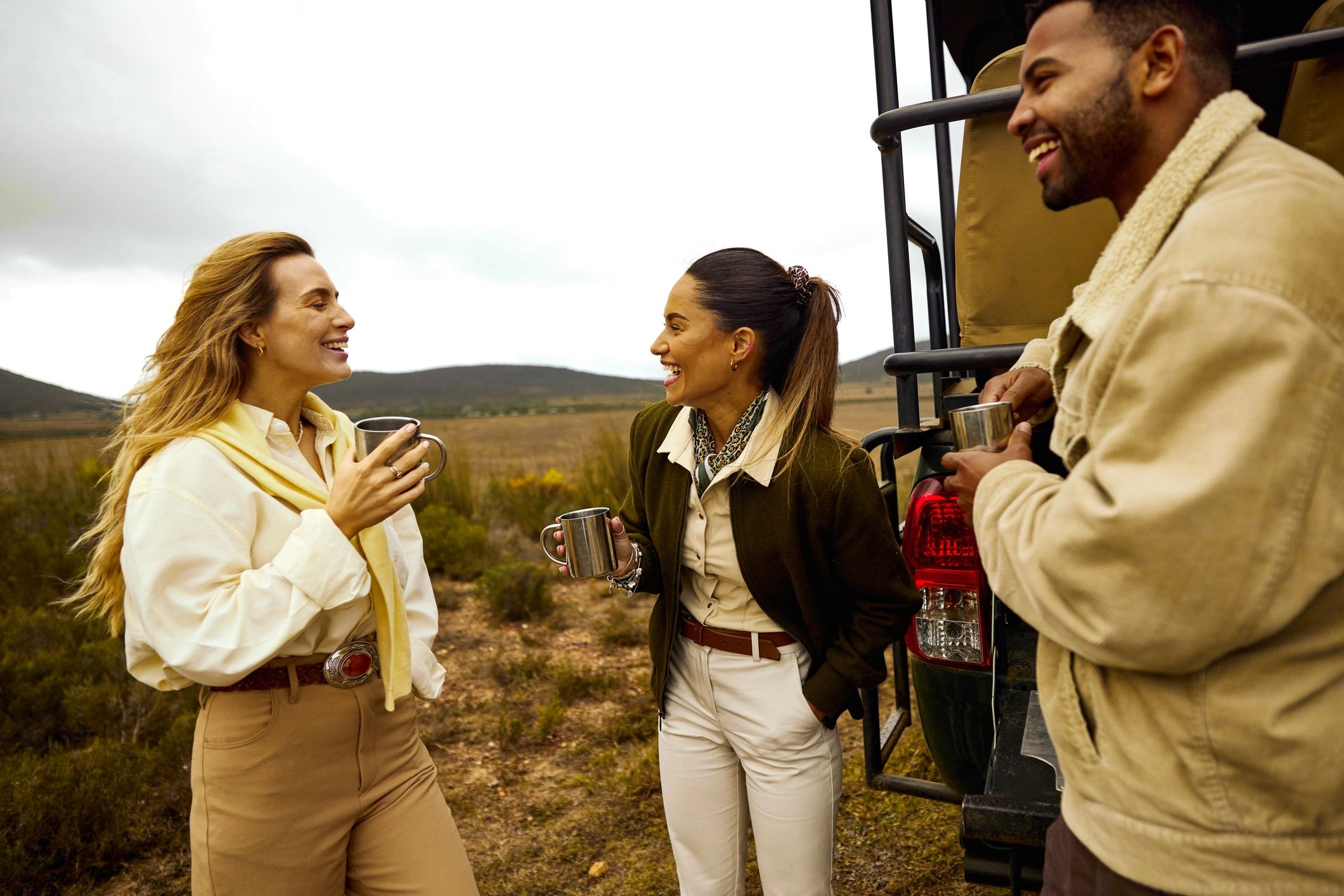 Two women talking and laughing outdoors
